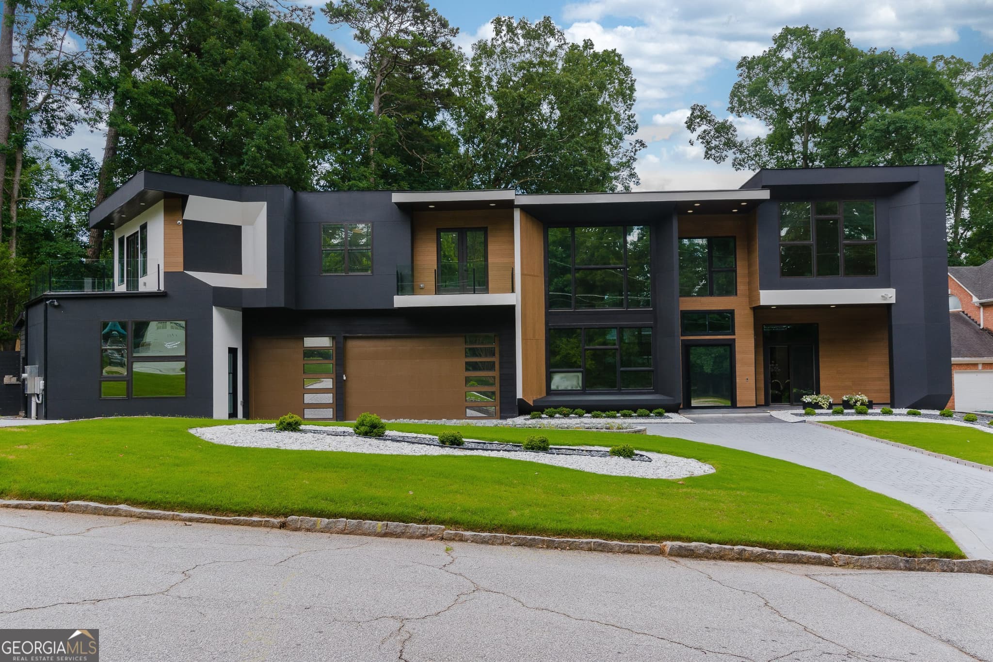 7 bedroom, 7 bathroom, 6,800 sq ft single family residence for sale at 2401 NE Greenglade Road, Atlanta, GA 30345 — photo 1 of 47