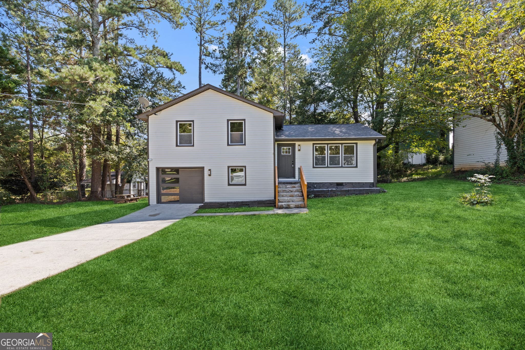 3 bedroom, 2 bathroom, 1,320 sq ft single family residence for sale at 5 Hidden Valley Drive, Lawrenceville, GA 30044 — photo 1 of 31