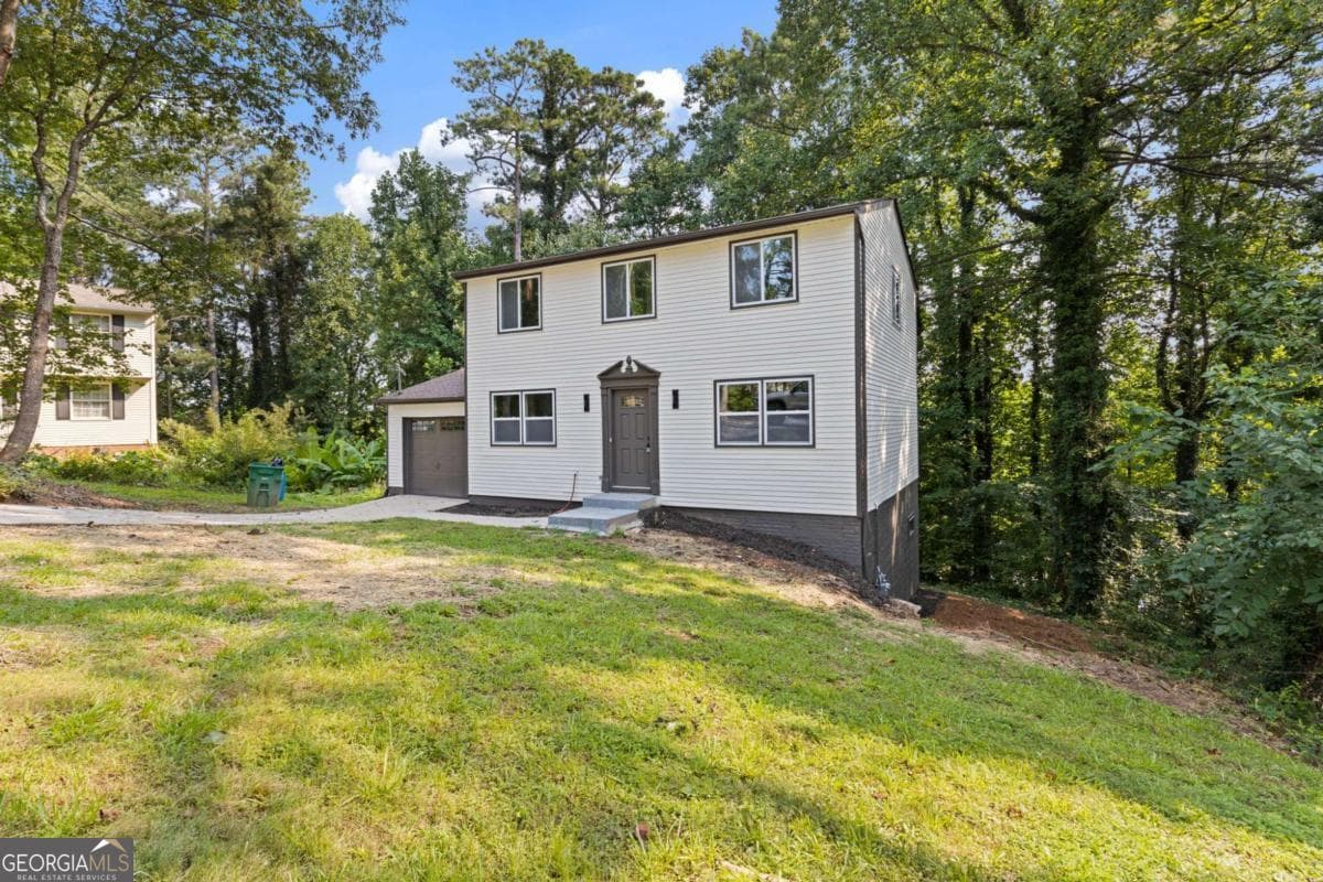 3 bedroom, 2.5 bathroom, 1,560 sq ft single family residence for sale at 5420 Robin Hill Court, Norcross, GA 30093 — photo 2