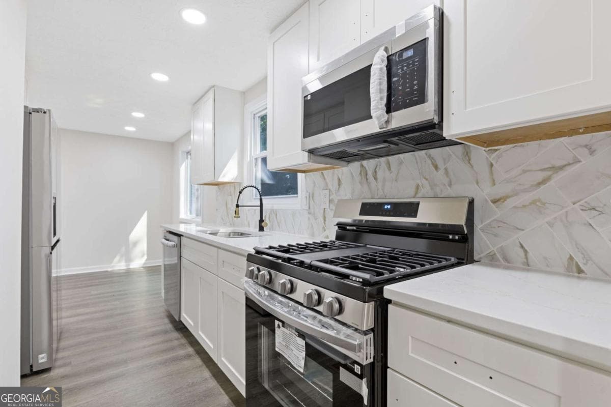 3 bedroom, 2.5 bathroom, 1,560 sq ft single family residence for sale at 5420 Robin Hill Court, Norcross, GA 30093 — photo 7