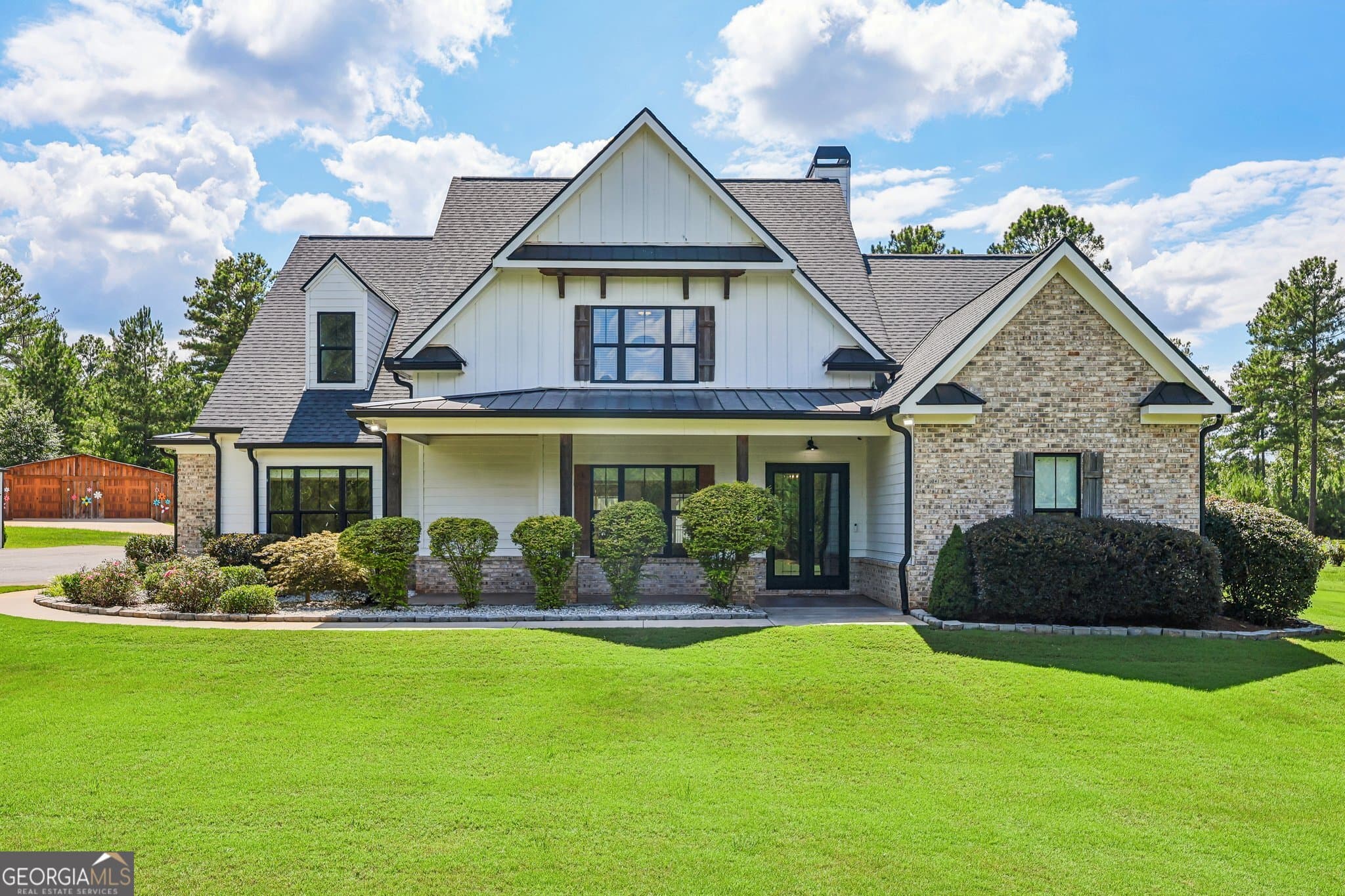 4 bedroom, 4.5 bathroom, 4,160 sq ft single family residence for sale at 1970 Smith Road, Forsyth, GA 31029 — photo 2