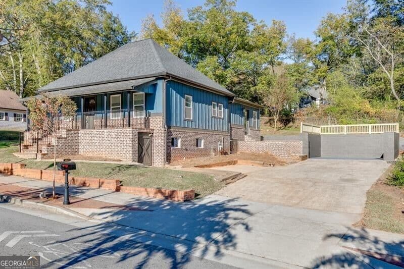 4 bedroom, 2 bathroom, 1,628 sq ft single family residence for rent at 4615 S Lee Street, Buford, GA 30518 for $2,495 a month — photo 2