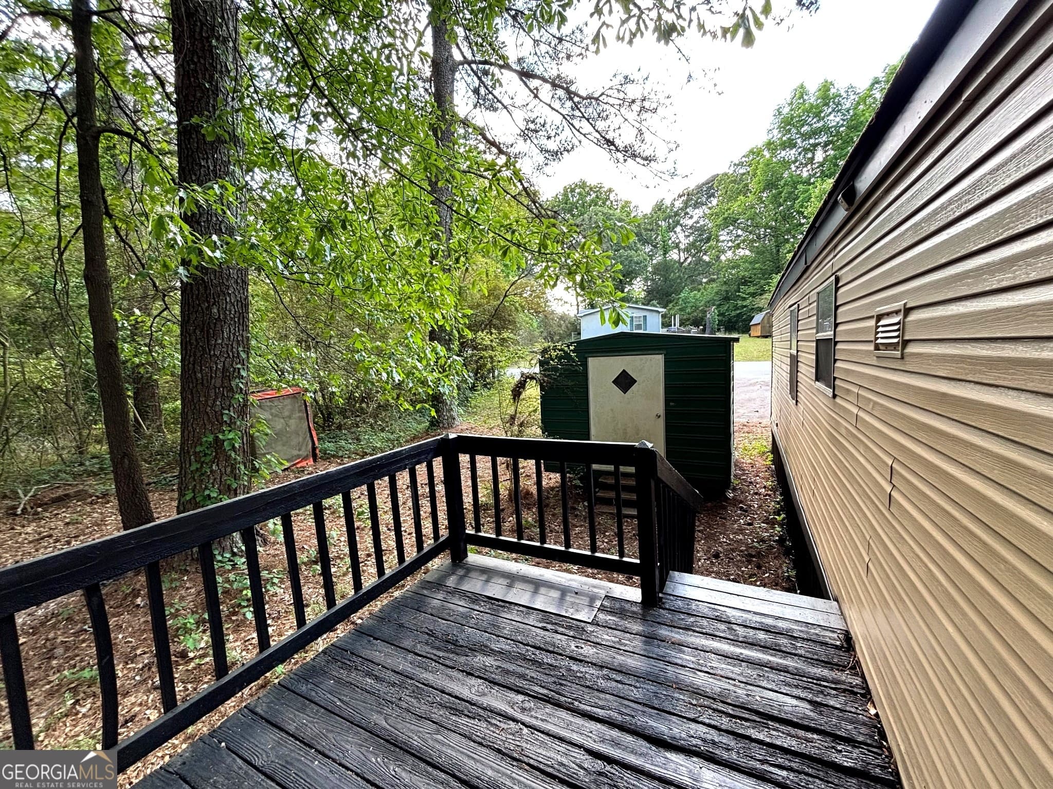 2 bedroom, 2 bathroom, 1,400 sq ft manufactured home,single family residence for sale at 69 Pawnee Path, Locust Grove, GA 30248 — photo 7
