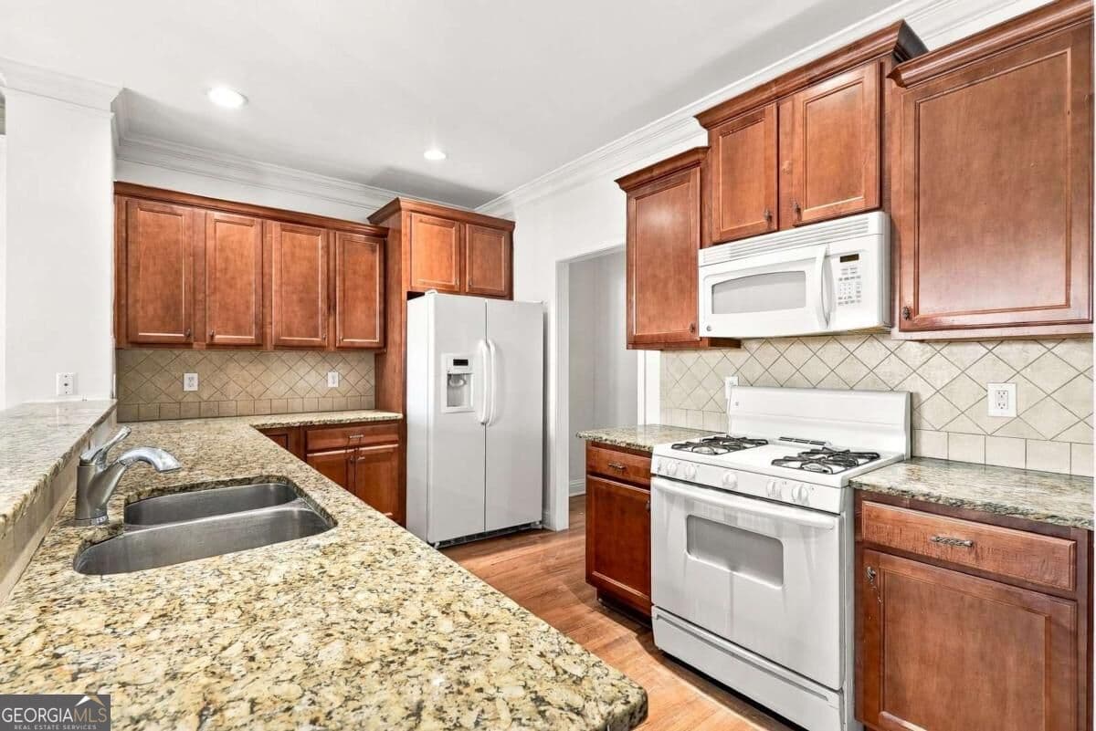 4 bedroom, 3.5 bathroom, 2,200 sq ft townhouse for sale at 4421 George David Way, Powder Springs, GA 30127 — photo 10