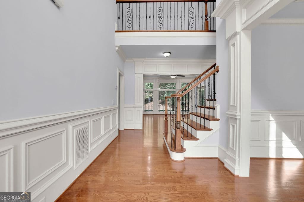 5 bedroom, 4.5 bathroom, 4,873 sq ft single family residence for sale at 5127 Bentwater Lane, Lilburn, GA 30047 — photo 6