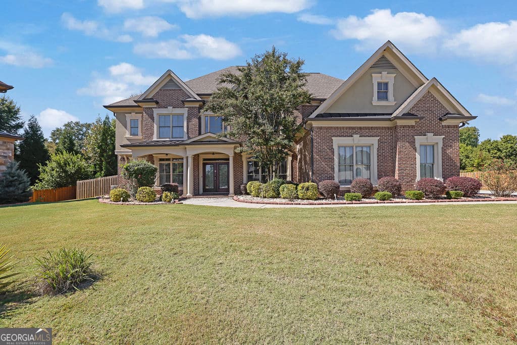 5 bedroom, 4.5 bathroom, 4,873 sq ft single family residence for sale at 5127 Bentwater Lane, Lilburn, GA 30047 — photo 3