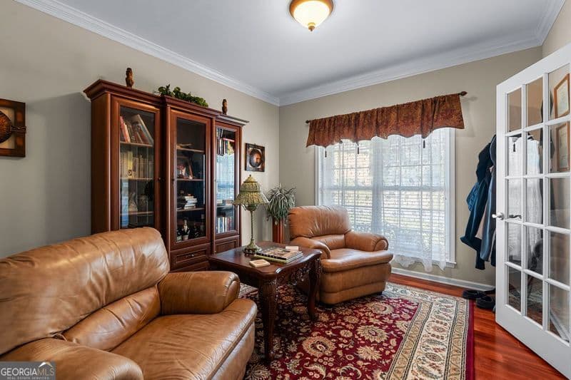 5 bedroom, 4 bathroom, 3,661 sq ft single family residence for sale at 15 Stonebridge Boulevard, Newnan, GA 30265 — photo 7