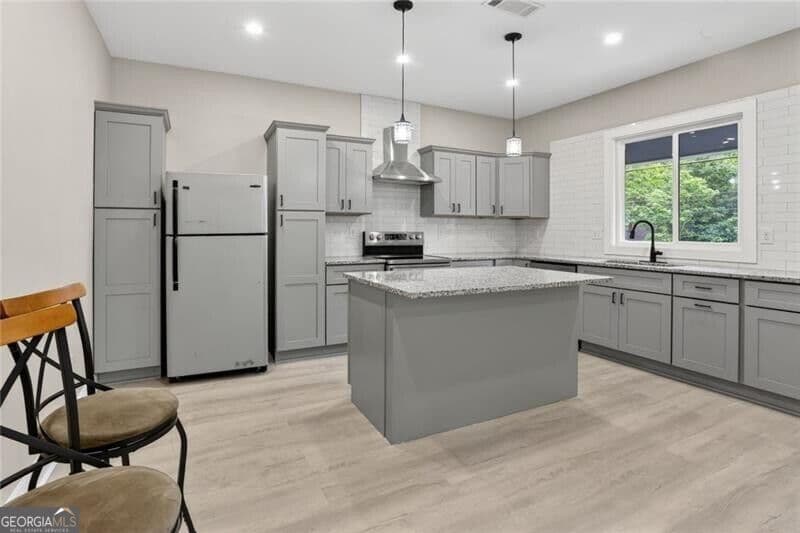 3 bedroom, 2.5 bathroom, 1,500 sq ft single family residence for sale at 607 E Solomon Street, Griffin, GA 30223 — photo 3