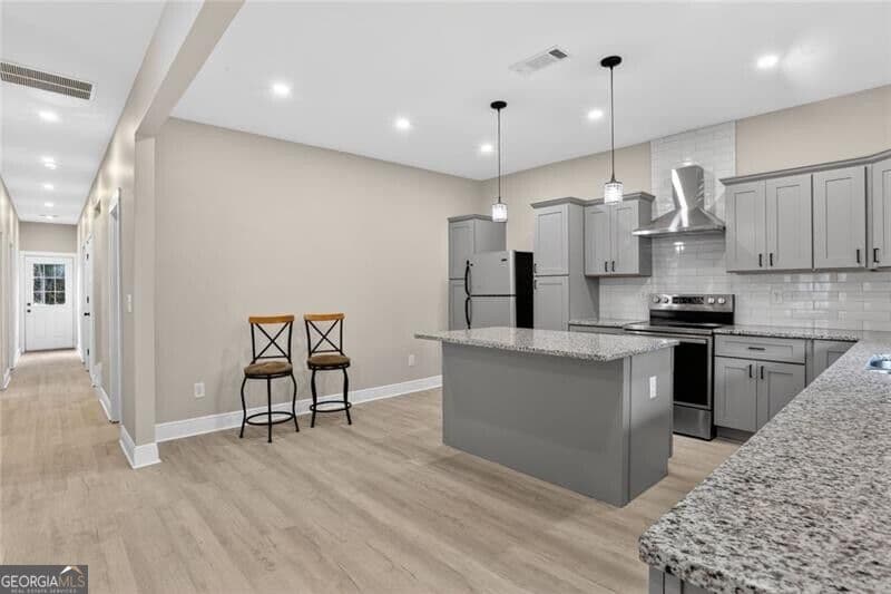 3 bedroom, 2.5 bathroom, 1,500 sq ft single family residence for sale at 607 E Solomon Street, Griffin, GA 30223 — photo 5