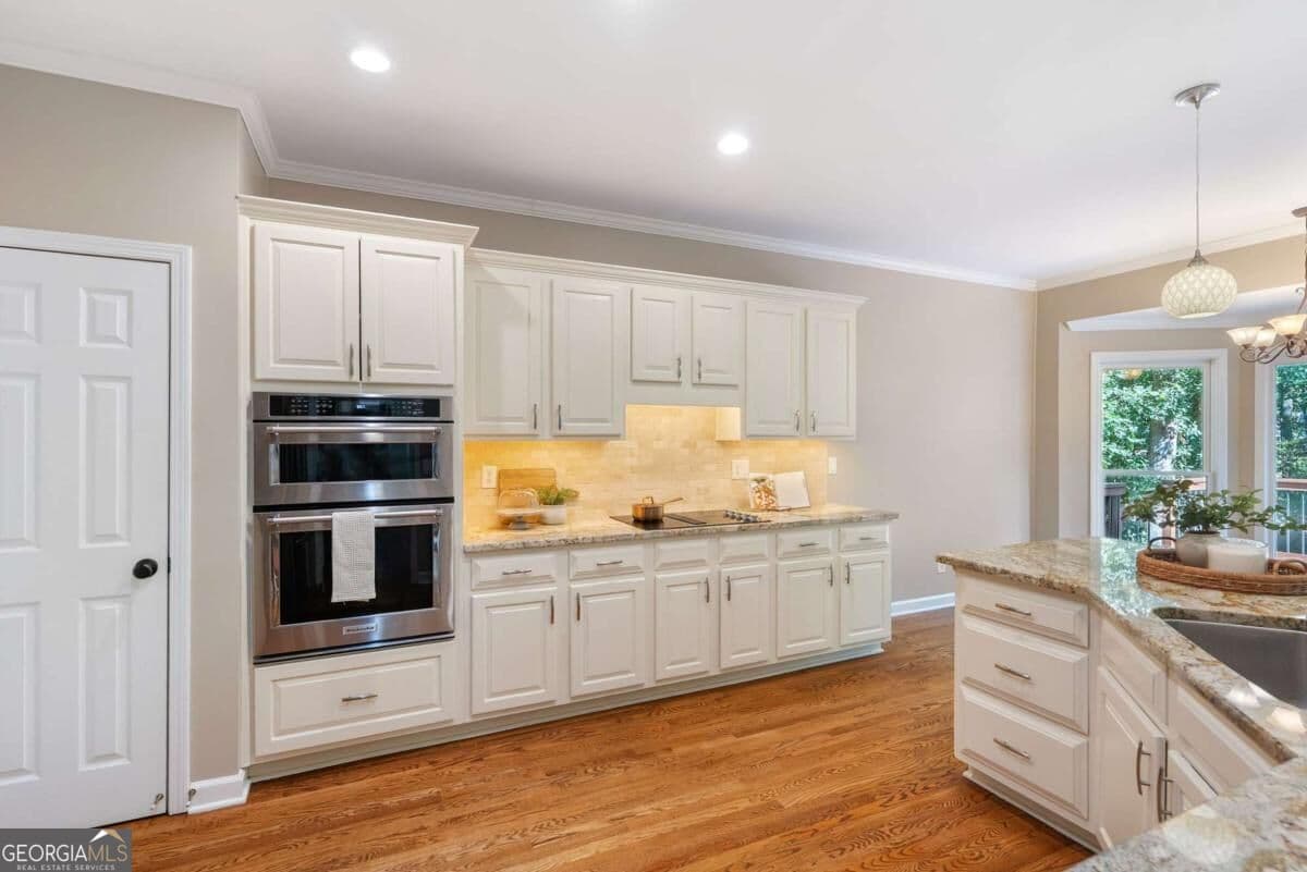 6 bedroom, 5 bathroom, 3,720 sq ft single family residence for sale at 135 Grand Avenue, Suwanee, GA 30024 — photo 10