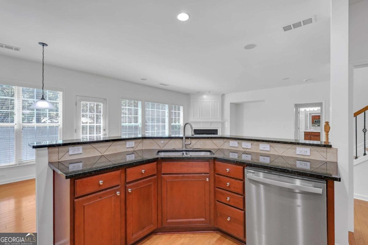5 bedroom, 3 bathroom, 2,472 sq ft single family residence for sale at 5608 Avonley Creek Drive, Sugar Hill, GA 30518 — photo 4