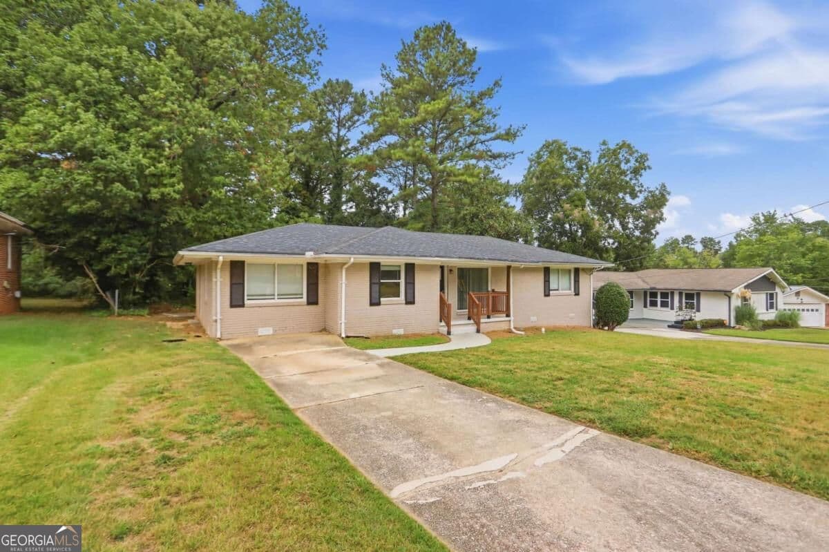 4 bedroom, 2 bathroom, 1,478 sq ft single family residence for sale at 2434 Shamrock Drive, Decatur, GA 30032 — photo 2