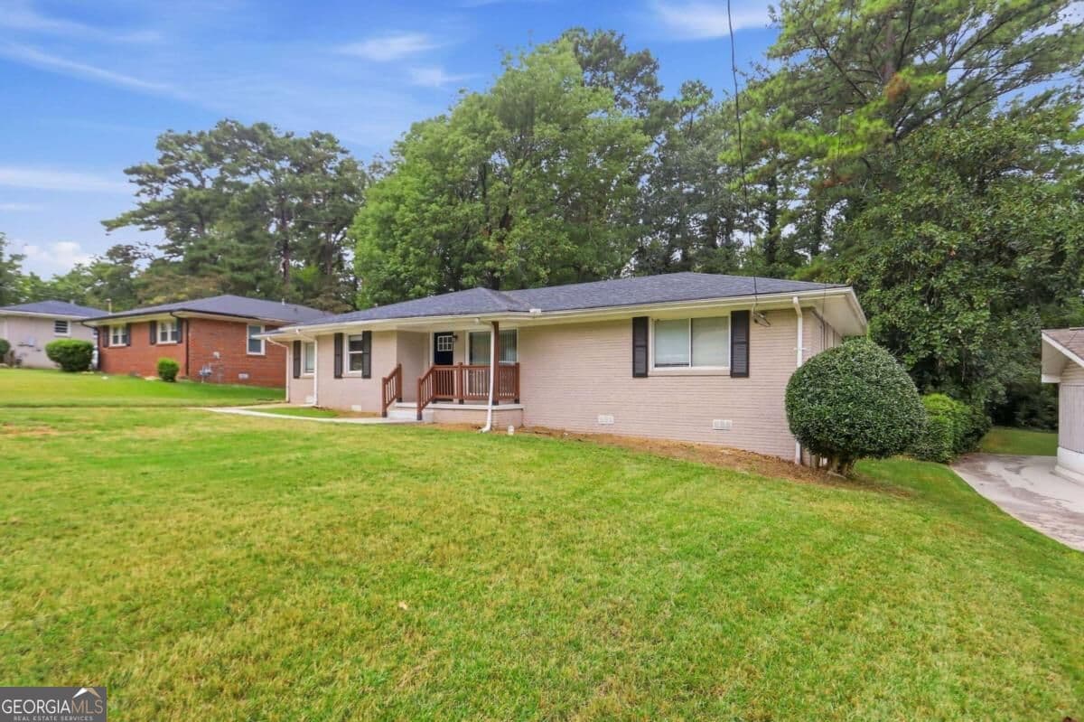 4 bedroom, 2 bathroom, 1,478 sq ft single family residence for sale at 2434 Shamrock Drive, Decatur, GA 30032 — photo 4
