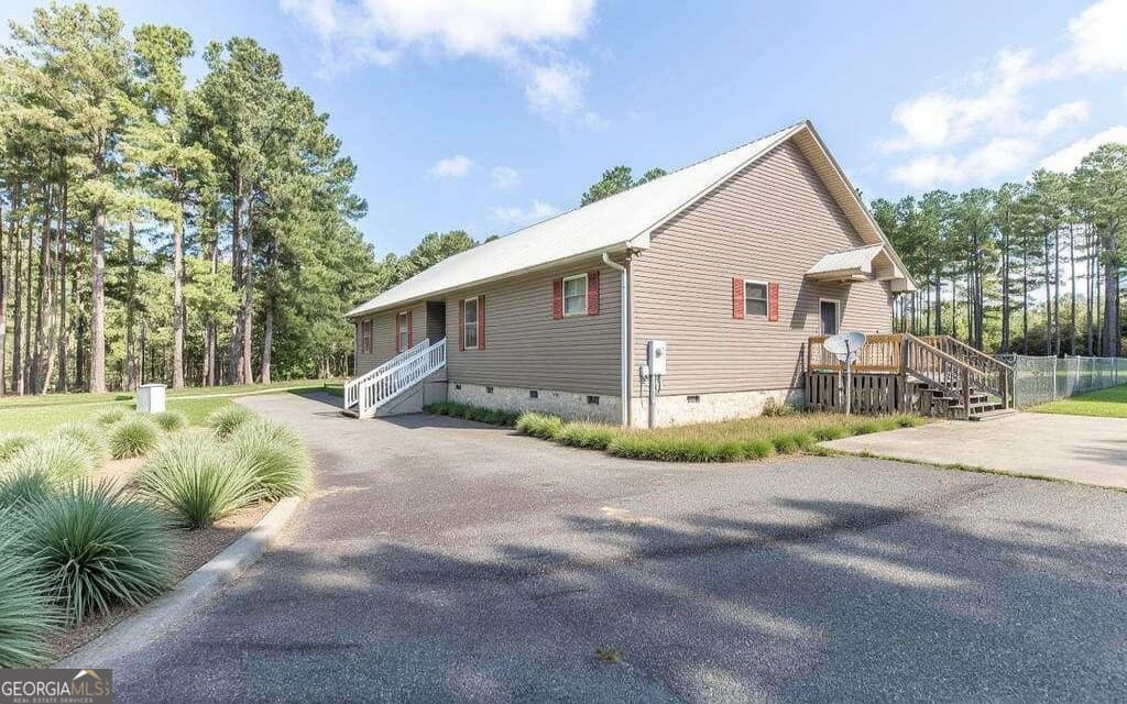 3 bedroom, 3 bathroom single family residence sold at 1058 David Mullis Road, Rentz, GA 31075