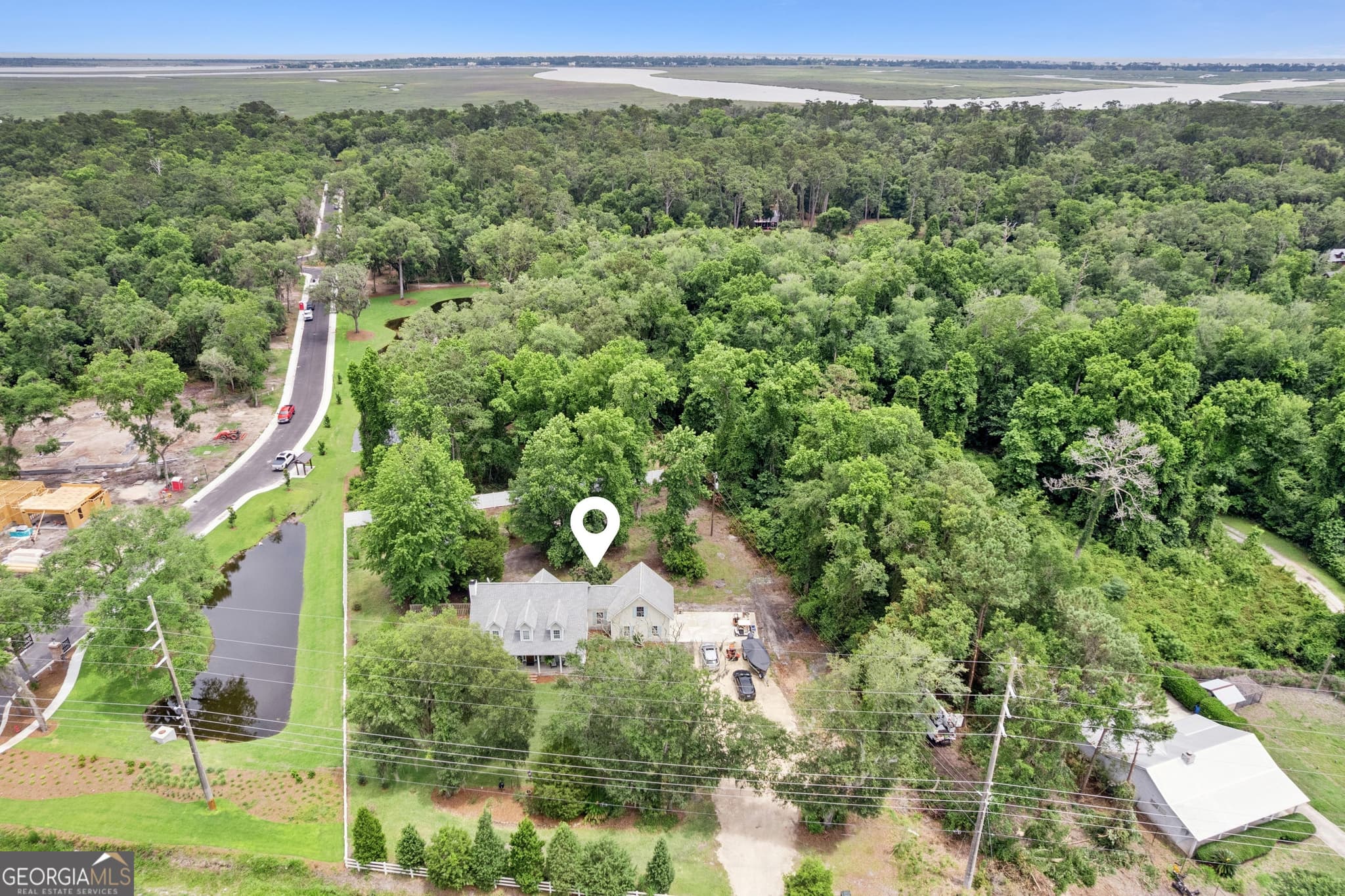 5 bedroom, 2.5 bathroom, 2,523 sq ft single family residence for sale at 112 Burns Landing, St. Simons, GA 31522 — photo 2