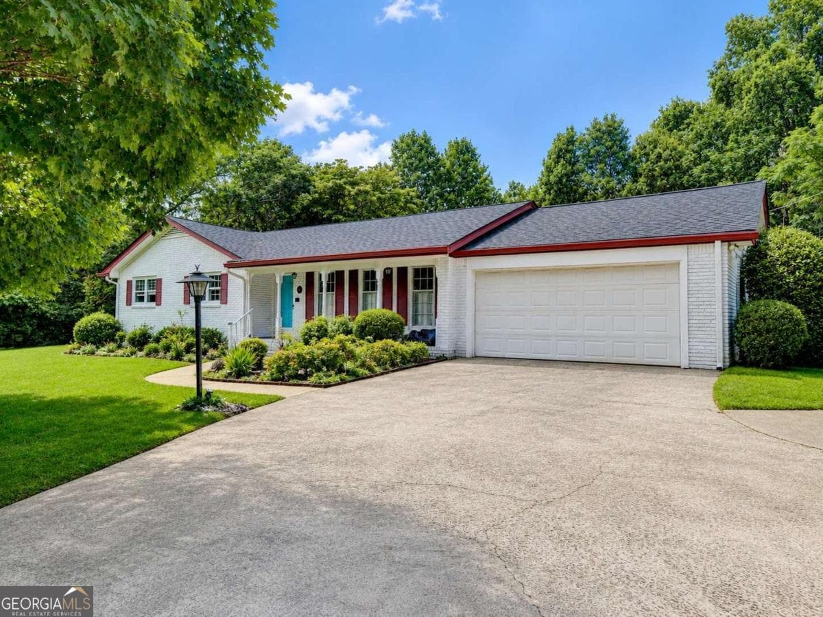 4 bedroom, 3 bathroom, 2,650 sq ft single family residence for sale at 4875 Five Forks Trickum Road, Lilburn, GA 30047 — photo 2