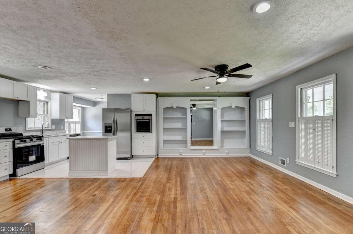 4 bedroom, 3 bathroom, 2,650 sq ft single family residence for sale at 4875 Five Forks Trickum Road, Lilburn, GA 30047 — photo 6