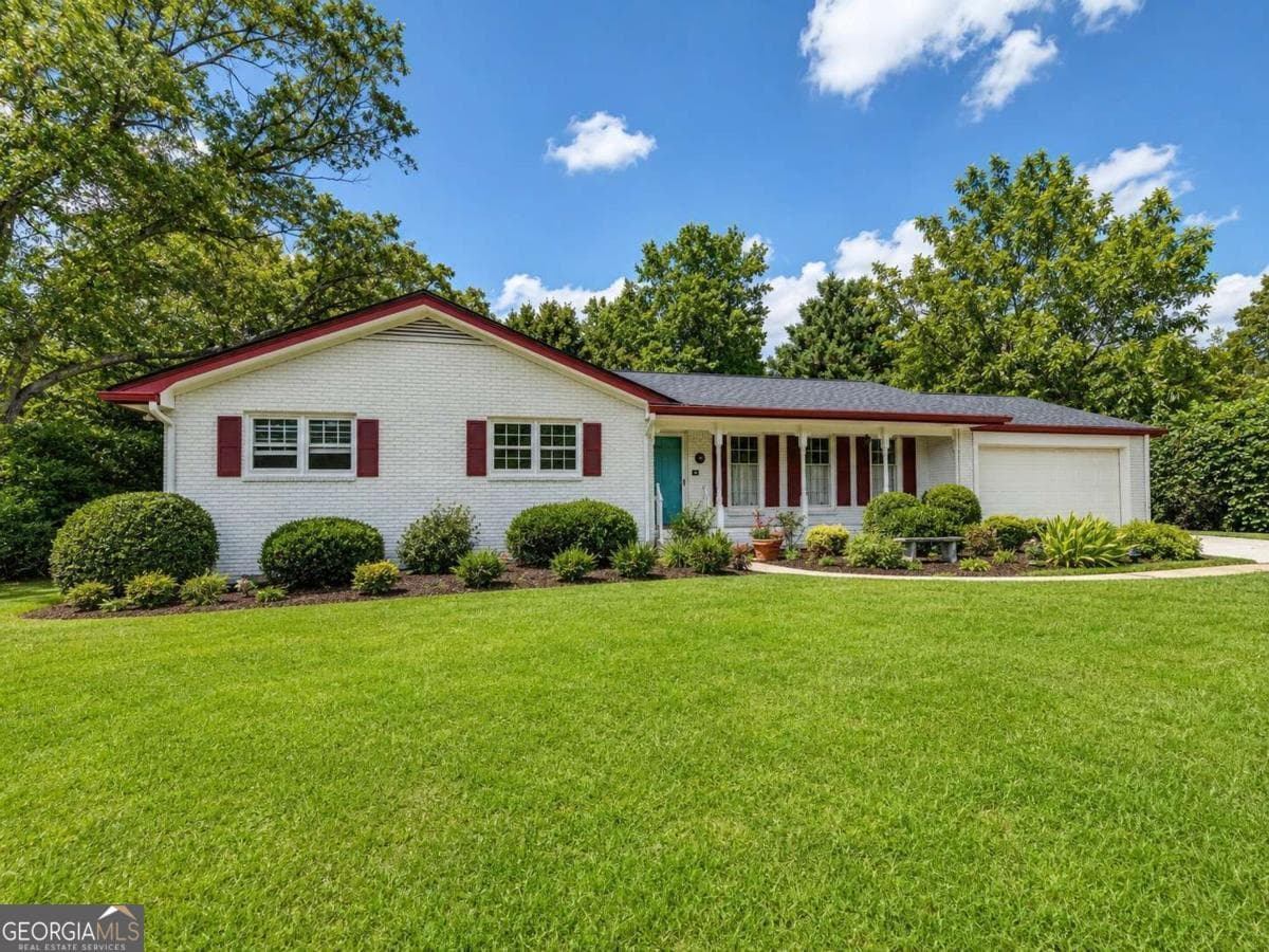 4 bedroom, 3 bathroom, 2,650 sq ft single family residence for sale at 4875 Five Forks Trickum Road, Lilburn, GA 30047 — photo 3