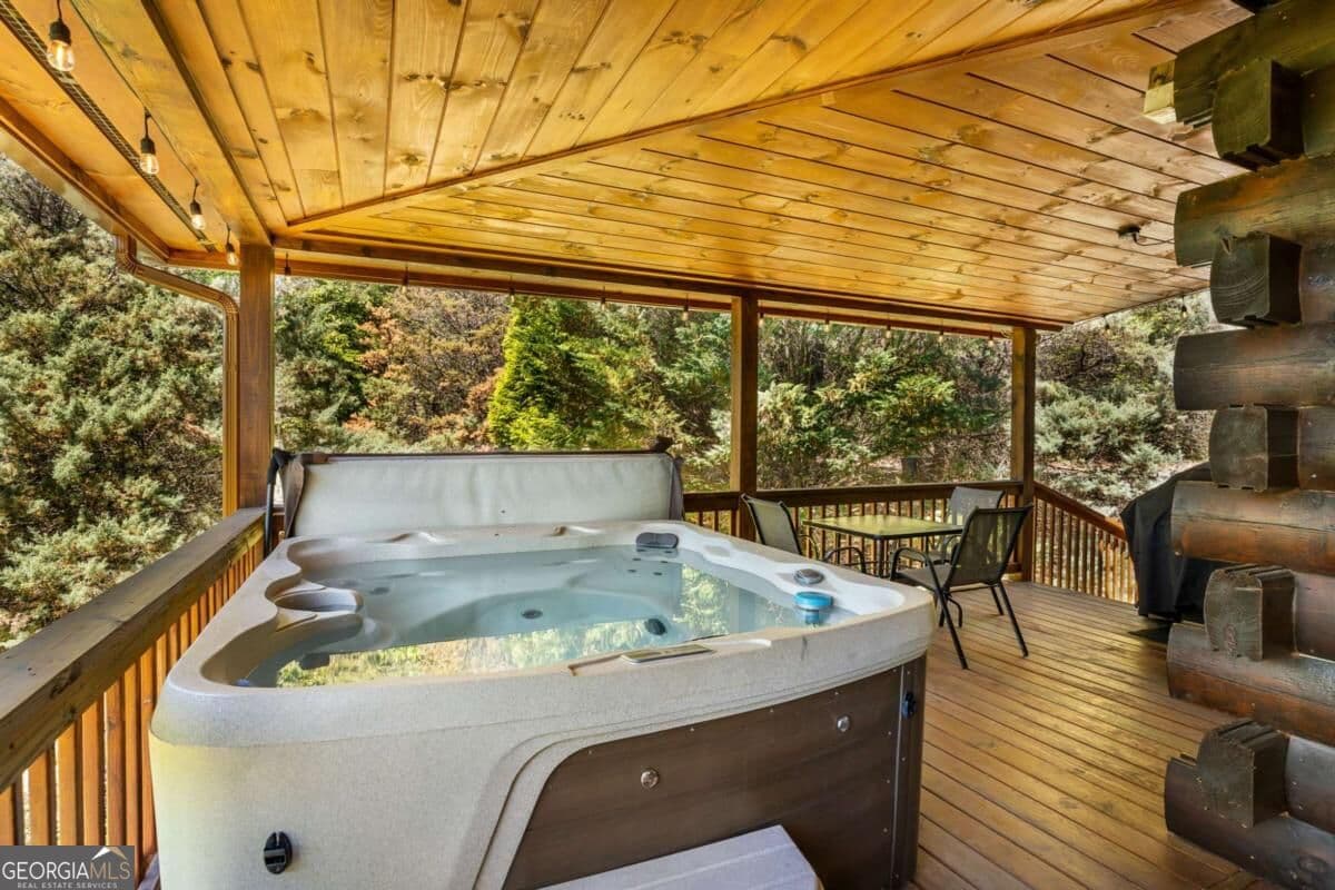 4 bedroom, 3 bathroom, 2,400 sq ft cabin,loft,single family residence for sale at 229 Old Mill Pond Road, Mineral Bluff, GA 30559 — photo 6