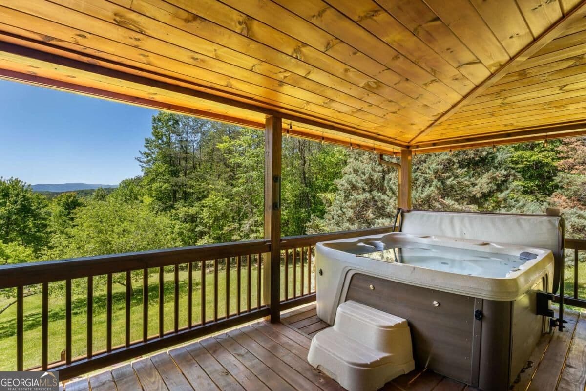 4 bedroom, 3 bathroom, 2,400 sq ft cabin,loft,single family residence for sale at 229 Old Mill Pond Road, Mineral Bluff, GA 30559 — photo 7