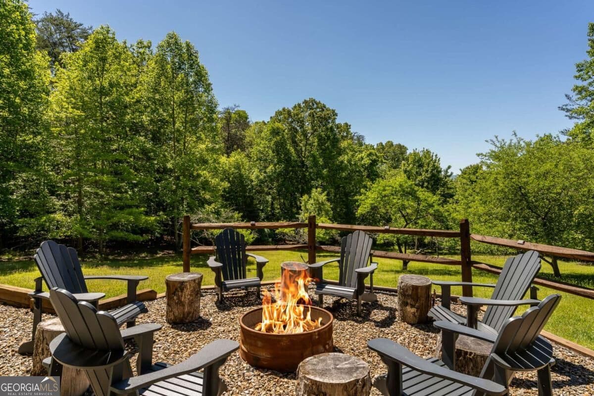 4 bedroom, 3 bathroom, 2,400 sq ft cabin,loft,single family residence for sale at 229 Old Mill Pond Road, Mineral Bluff, GA 30559 — photo 3