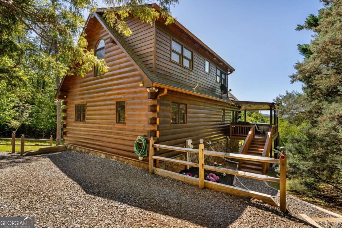 4 bedroom, 3 bathroom, 2,400 sq ft cabin,loft,single family residence for sale at 229 Old Mill Pond Road, Mineral Bluff, GA 30559 — photo 10