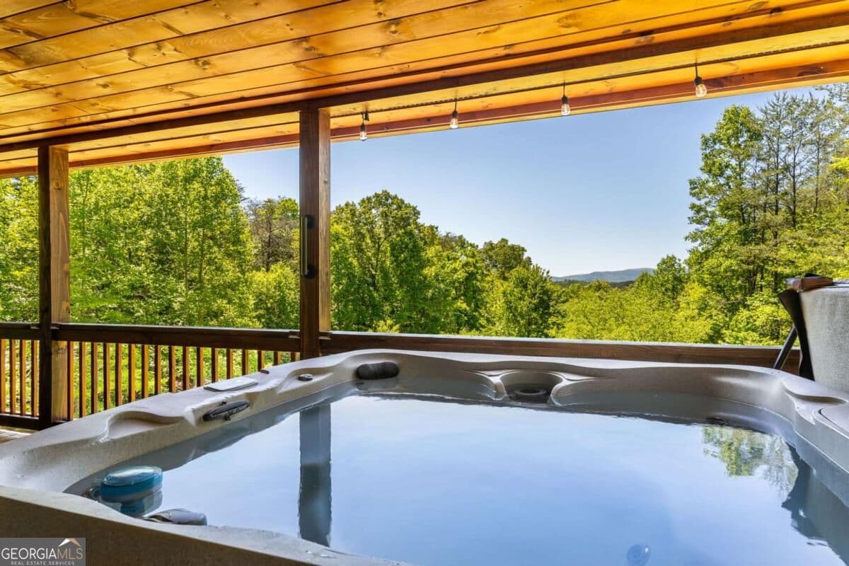 4 bedroom, 3 bathroom, 2,400 sq ft cabin,loft,single family residence for sale at 229 Old Mill Pond Road, Mineral Bluff, GA 30559 — photo 4