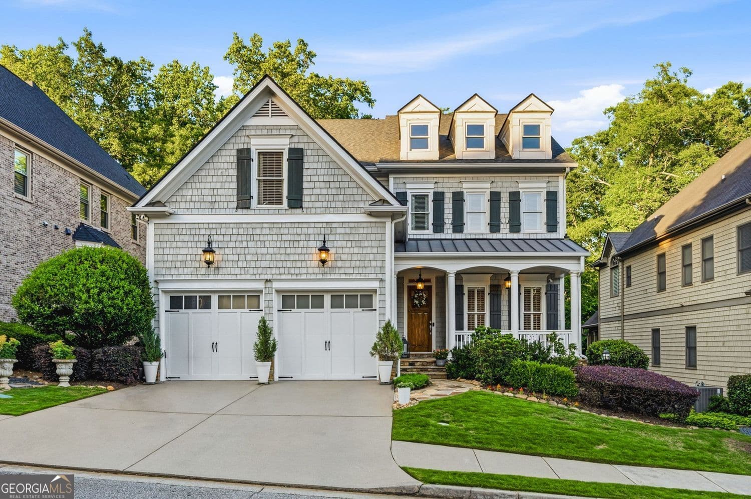 5 bedroom, 4.5 bathroom, 4,546 sq ft single family residence sold at 1056 Bluffhaven Way, Brookhaven, GA 30319