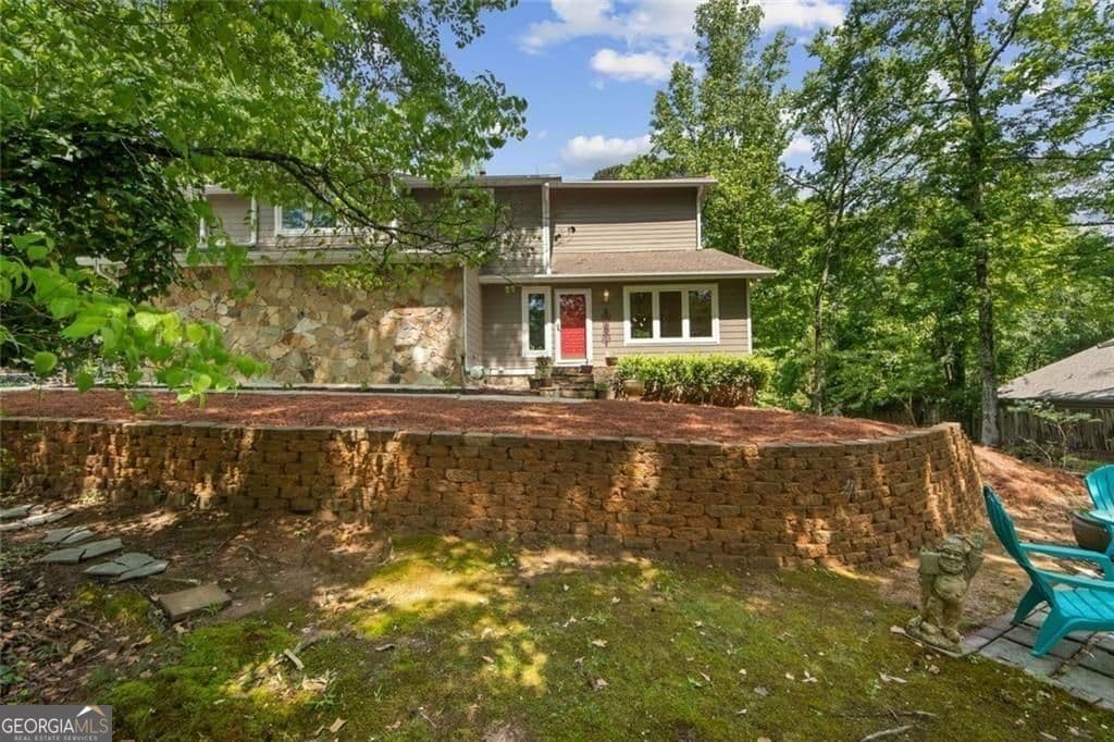 4 bedroom, 2.5 bathroom, 3,608 sq ft single family residence for sale at 5080 Nesbit Ferry Lane, Sandy Springs, GA 30350 — photo 6