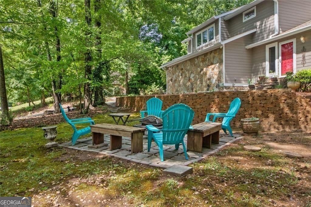 4 bedroom, 2.5 bathroom, 3,608 sq ft single family residence for sale at 5080 Nesbit Ferry Lane, Sandy Springs, GA 30350 — photo 5