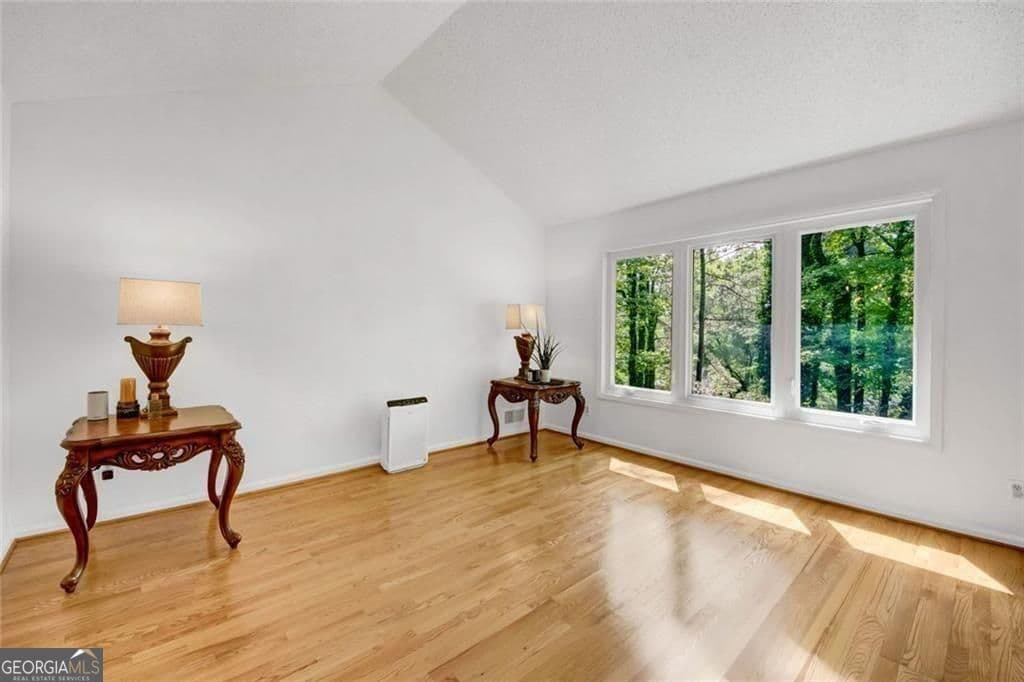 4 bedroom, 2.5 bathroom, 3,608 sq ft single family residence for sale at 5080 Nesbit Ferry Lane, Sandy Springs, GA 30350 — photo 10