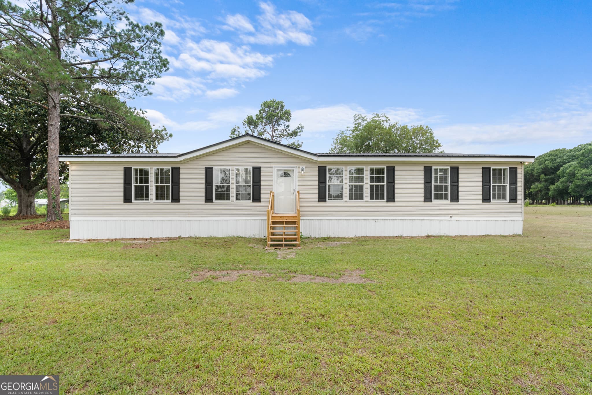 3 bedroom, 2 bathroom, 2,240 sq ft manufactured home,single family residence under contract at 703 Dave Callaway Road, Collins, GA 30421