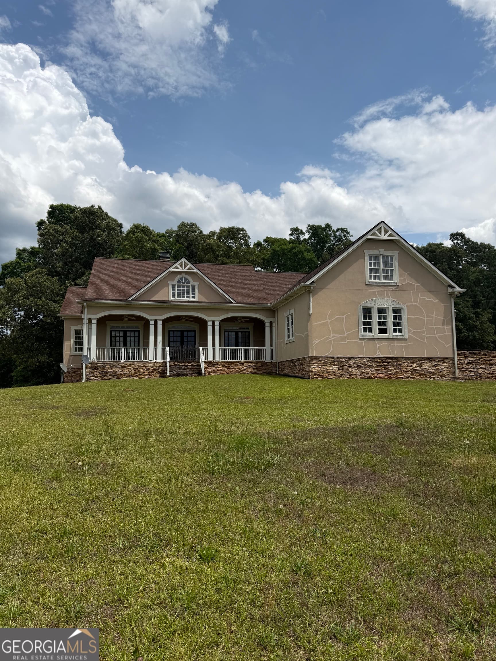 5 bedroom, 4.5 bathroom, 5,071 sq ft single family residence sold at 302 Norris Road, Barnesville, GA 30204