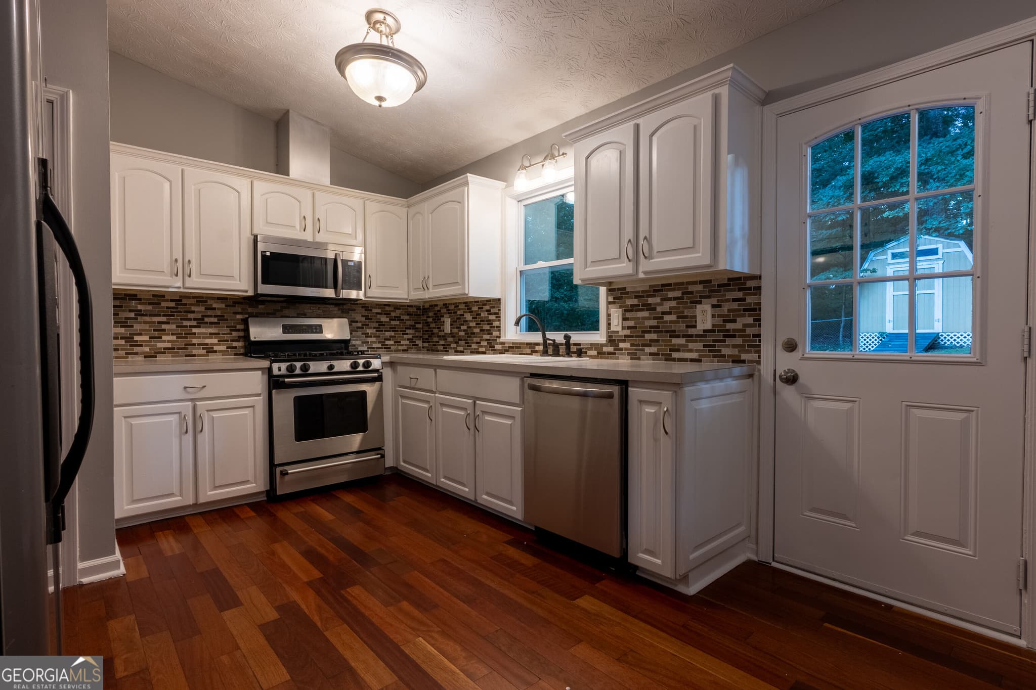 4 bedroom, 3 bathroom, 2,400 sq ft single family residence for sale at 2424 Rhine Court, Lawrenceville, GA 30043 — photo 6