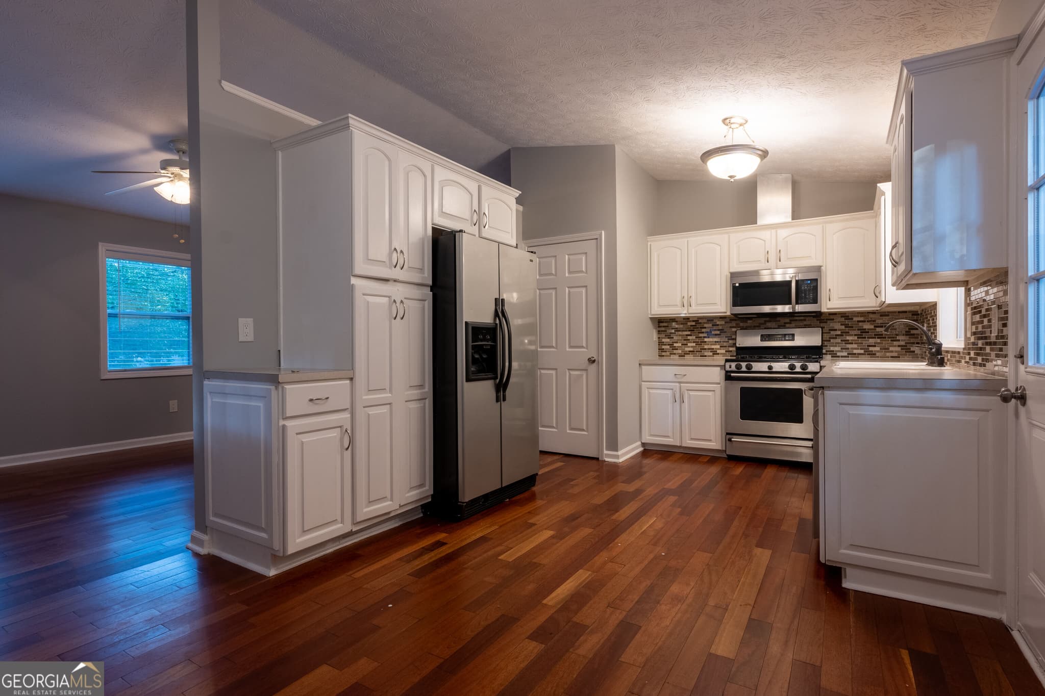 4 bedroom, 3 bathroom, 2,400 sq ft single family residence for sale at 2424 Rhine Court, Lawrenceville, GA 30043 — photo 5