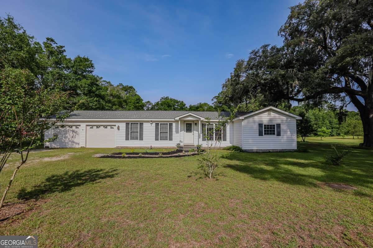 3 bedroom, 1.5 bathroom, 1,326 sq ft single family residence under contract at 1492 Sand Hill Road, Guyton, GA 31312