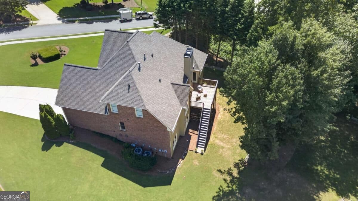 5 bedroom, 3 bathroom, 3,193 sq ft single family residence for sale at 5755 Shoals Drive, Buford, GA 30518 — photo 6