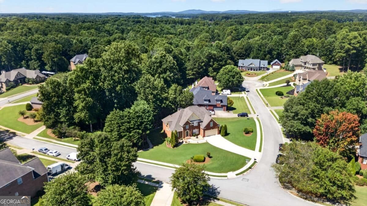 5 bedroom, 3 bathroom, 3,193 sq ft single family residence for sale at 5755 Shoals Drive, Buford, GA 30518 — photo 4