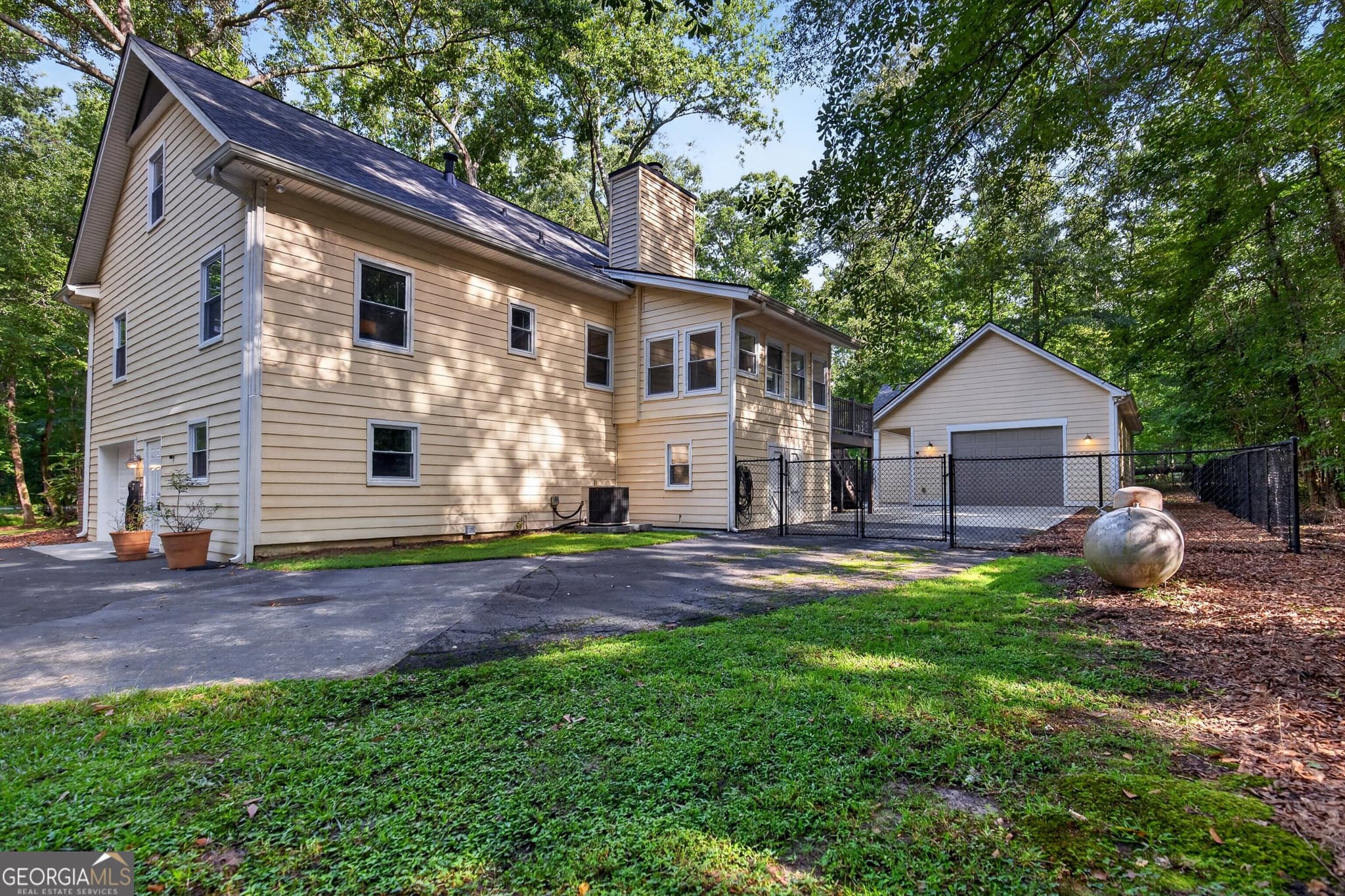 4 bedroom, 3.5 bathroom, 3,797 sq ft single family residence for sale at 121 Broom Boulevard, Fayetteville, GA 30215 — photo 6