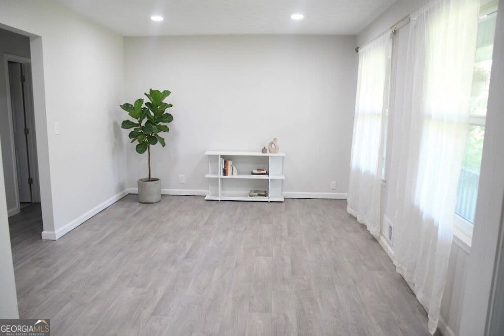 6 bedroom, 4 bathroom, 2,548 sq ft single family residence for sale at 2588 Kings Way, Lawrenceville, GA 30044 — photo 4