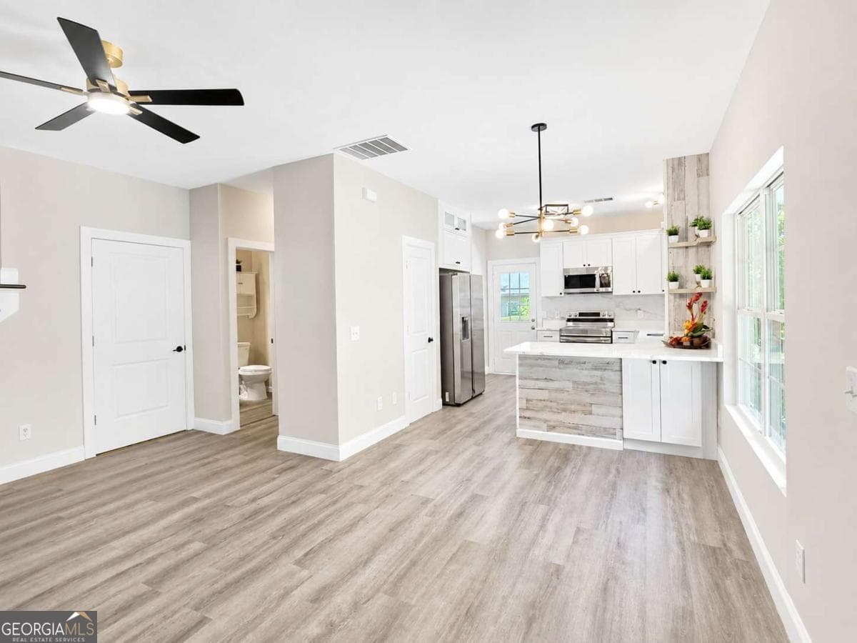 3 bedroom, 1.5 bathroom single family residence for sale at 9005 Lemans Trail, Gainesville, GA 30506 — photo 5