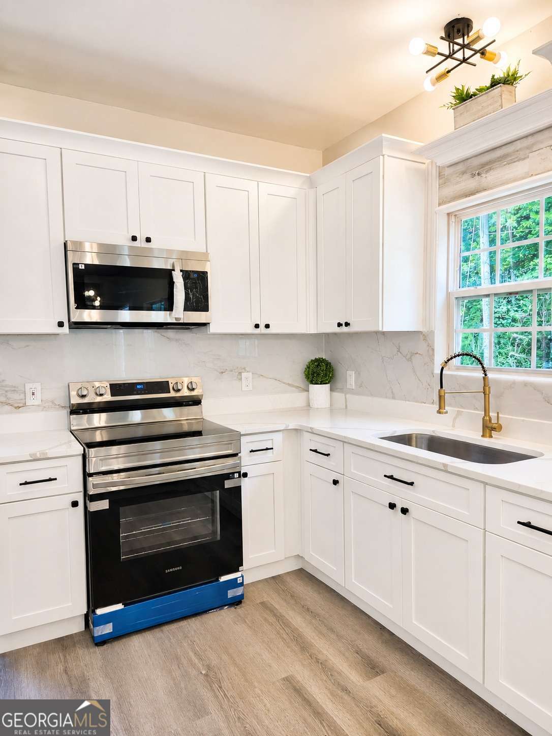 3 bedroom, 1.5 bathroom single family residence for sale at 9005 Lemans Trail, Gainesville, GA 30506 — photo 8