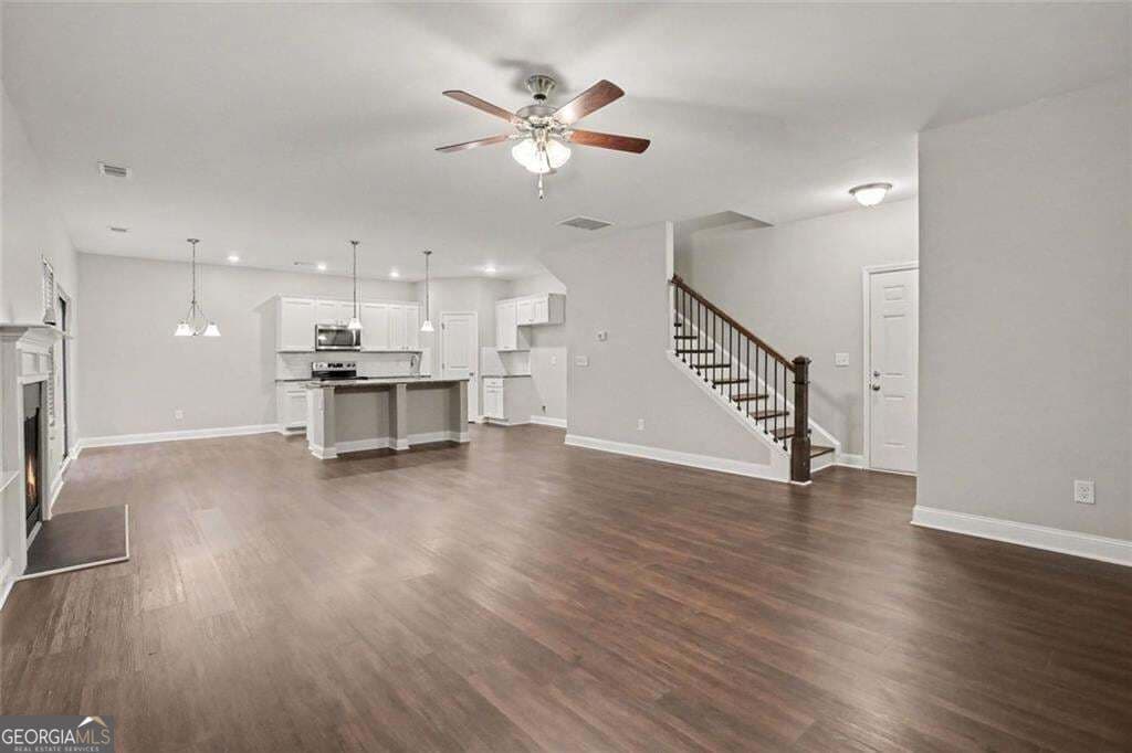 4 bedroom, 2.5 bathroom, 2,344 sq ft single family residence for sale at 316 Trae Court, Hampton, GA 30228 — photo 4