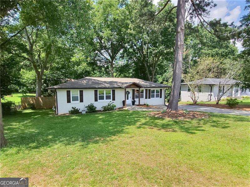 3 bedroom, 2 bathroom, 1,239 sq ft single family residence for sale at 3296 Old Concord Road, Smyrna, GA 30082 — photo 4