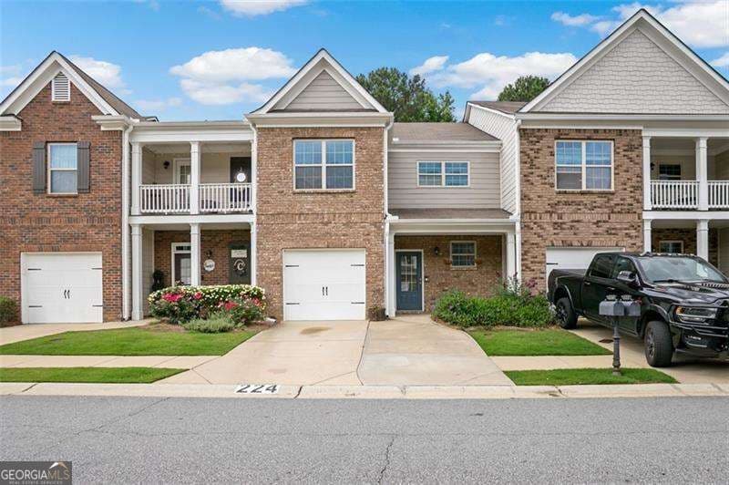 3 bedroom, 2.5 bathroom, 1,902 sq ft townhouse for sale at 224 Madison Avenue, Acworth, GA 30102 — photo 1 of 16