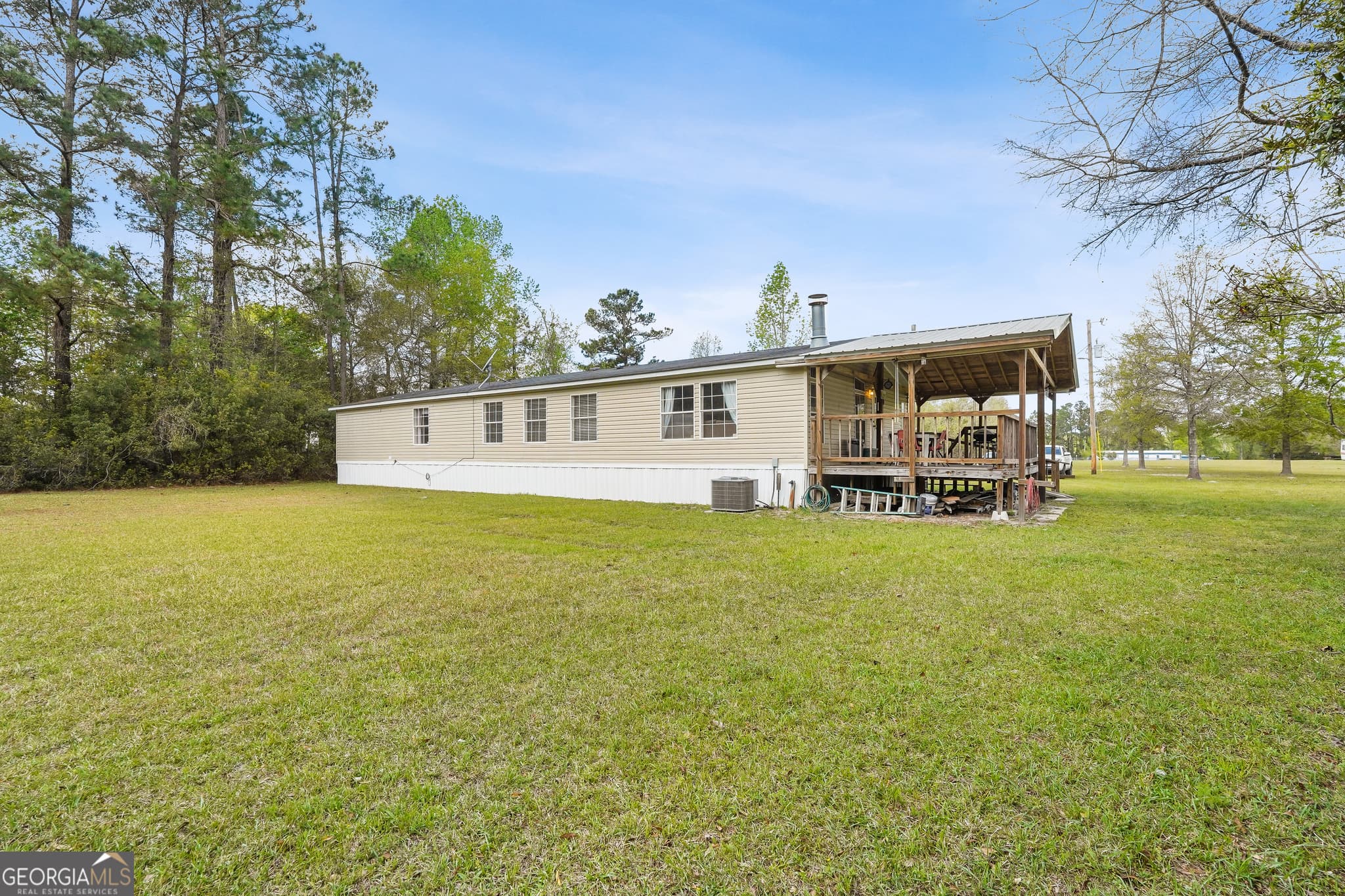 3 bedroom, 2.5 bathroom, 1,890 sq ft manufactured home,single family residence for sale at 1298 Lee Road, Pembroke, GA 31321 — photo 2