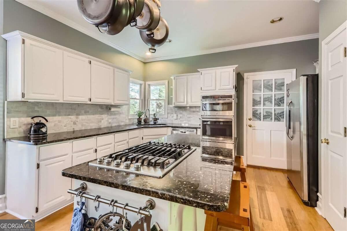 5 bedroom, 3.5 bathroom single family residence for sale at 1872 Lake Lucerne Drive, Lilburn, GA 30047 — photo 3