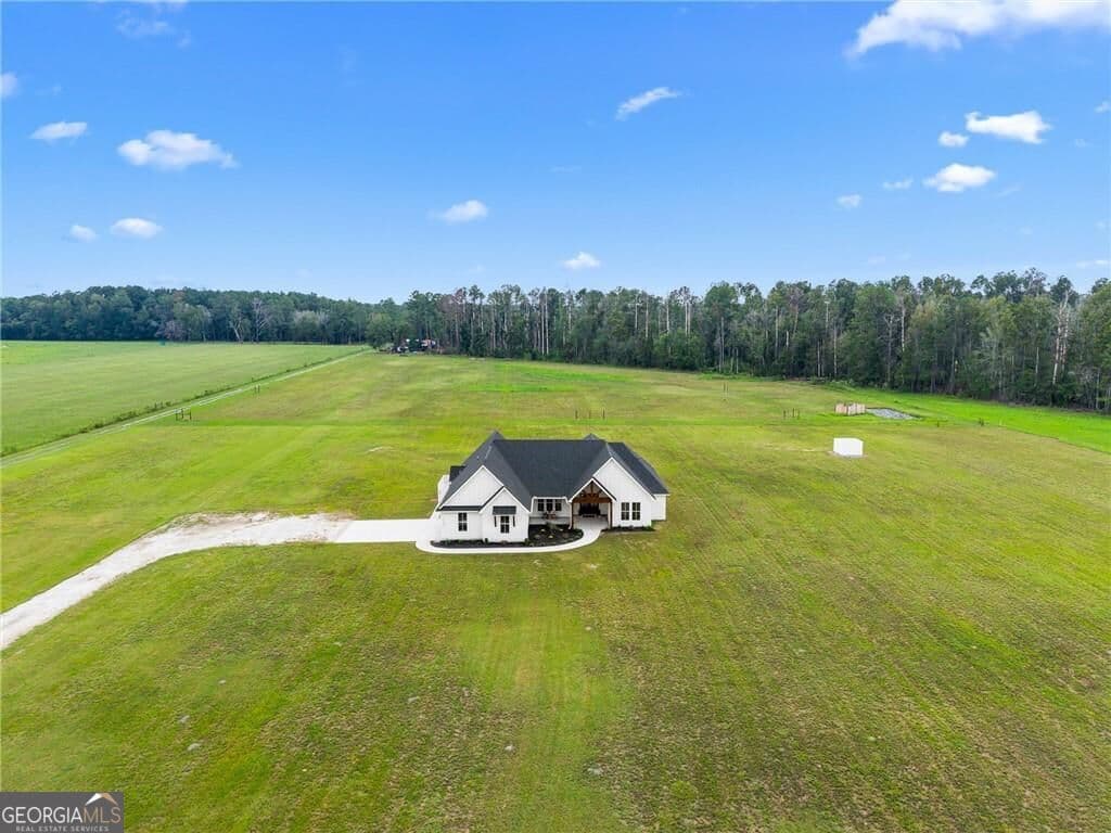 4 bedroom, 3.5 bathroom, 2,303 sq ft single family residence under contract at 10143 Us Highway 80, Brooklet, GA 30415 — photo 2