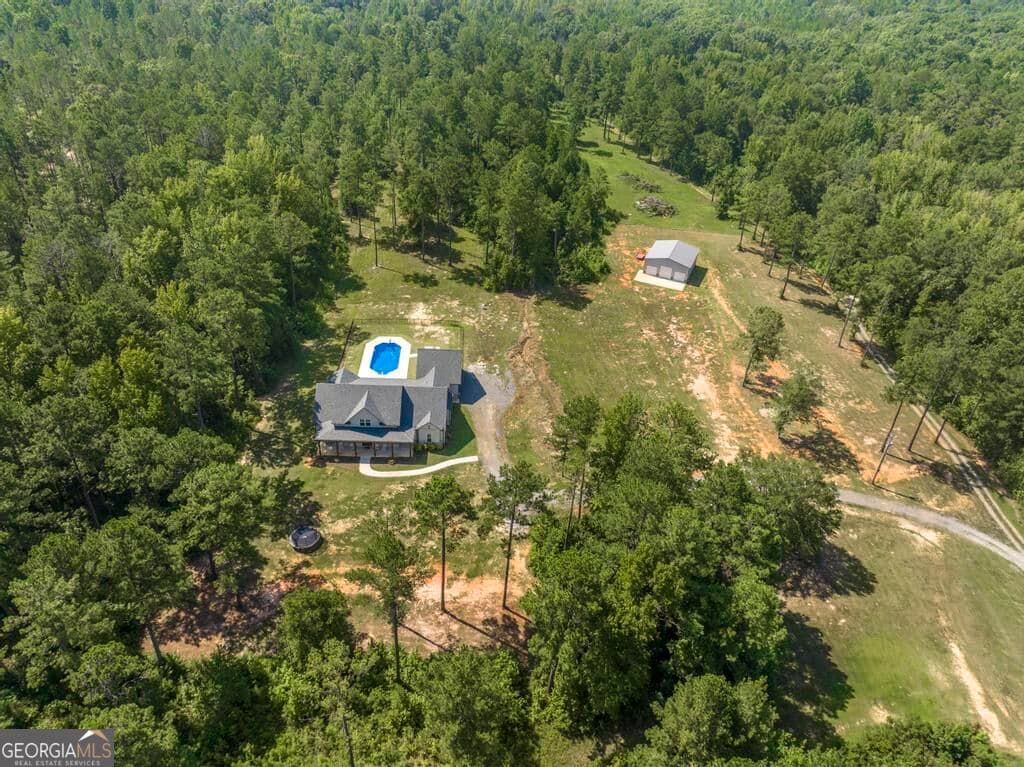 5 bedroom, 4 bathroom, 2,769 sq ft single family residence for sale at 665 Edge Road, Forsyth, GA 31029 — photo 2