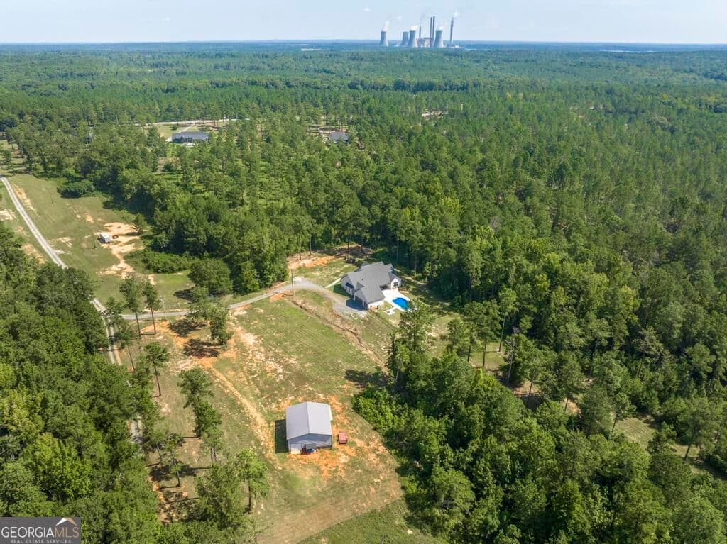 5 bedroom, 4 bathroom, 2,769 sq ft single family residence for sale at 665 Edge Road, Forsyth, GA 31029 — photo 6